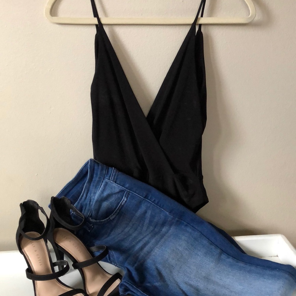 Low cut black body suit